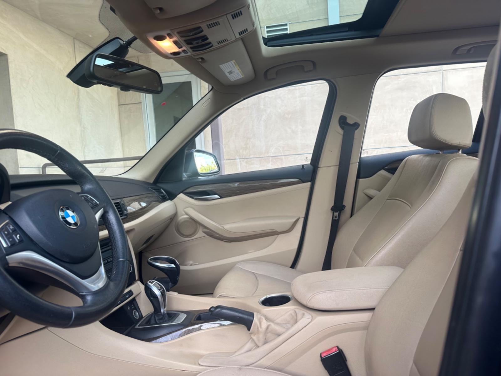 2014 Gray /black BMW X1 leather (WBAVM1C58EV) with an 4 CYLINDER engine, Automatic transmission, located at 30 S. Berkeley Avenue, Pasadena, CA, 91107, (626) 248-7567, 34.145447, -118.109398 - Photo #9